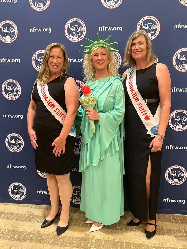 Karie Brown and Jennifer Sefzik with Lady Liberty.