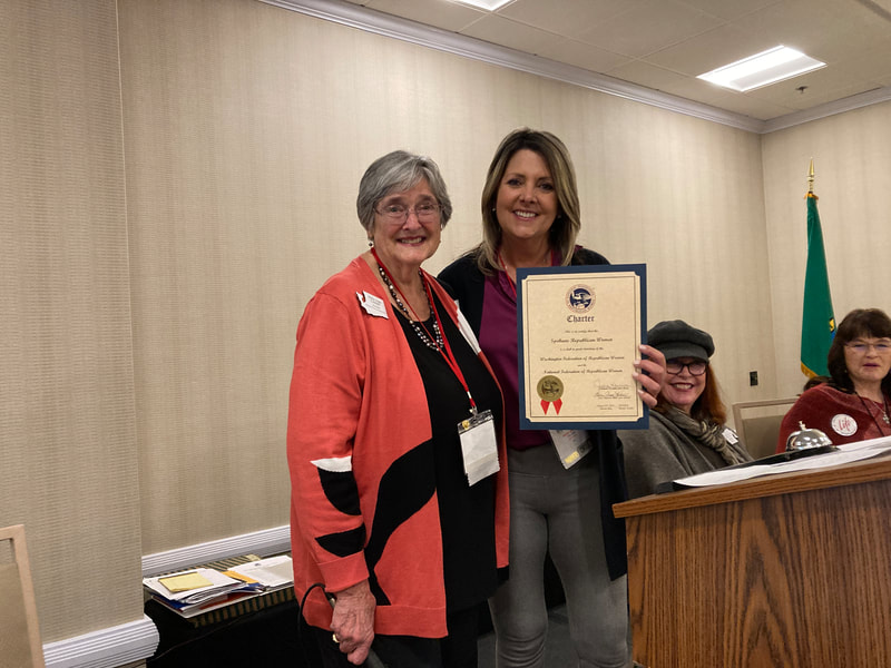 Spokane Club was presented with their charter certificate. 