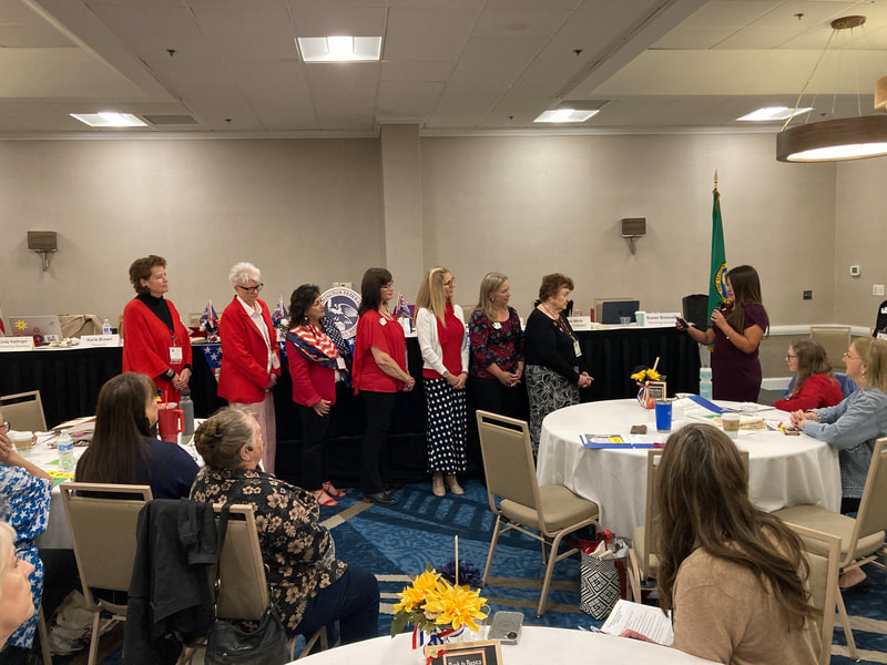 New officers taking their oath from NFRW Secretary Cindy Casaus.